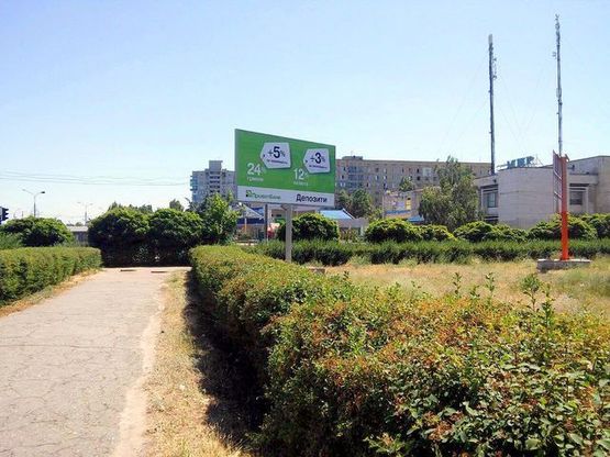 Фото рекламной плоскости по адресу Победы пр. - героев АТО пр. (напротив  ТЦ"Элефант",ТЦ"ЮГ",кинотеатра "Мир")