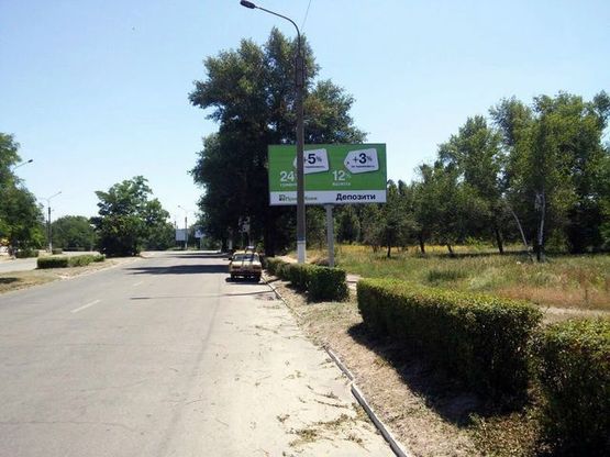 Фото рекламной плоскости по адресу Победы пр. (район поворота на 50-летия СССР пр.)