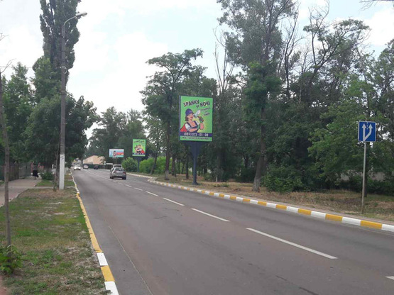 Фото рекламной плоскости по адресу ул. Центральная, возле ж/д переезда