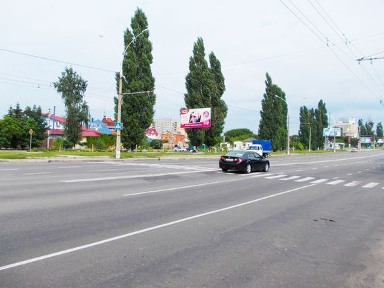 Фото рекламной плоскости по адресу Харьковская ул. (напротив ресторана "Алаверды", 200 м к АЗС "ОККО")