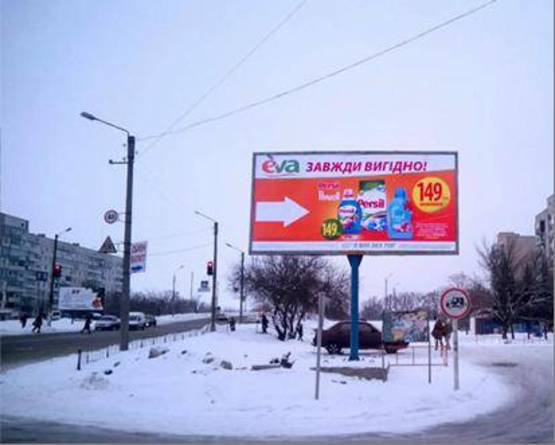 Фото рекламной плоскости по адресу ул.Моторного/ул.Кутузова (Торговый Центр, с-т "Сильпо", 5м-н)