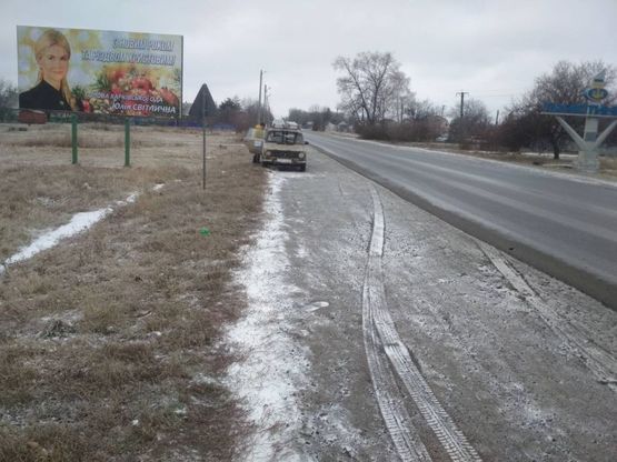 Фото рекламної площини за адресою пос.Панютино, Лозовской р-н тр.Р-51 (въезд)