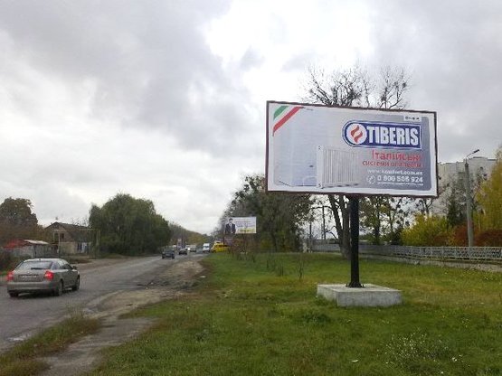 Фото рекламной плоскости по адресу ул. Дружбы, 126, возле уч.корпуса ДАУ