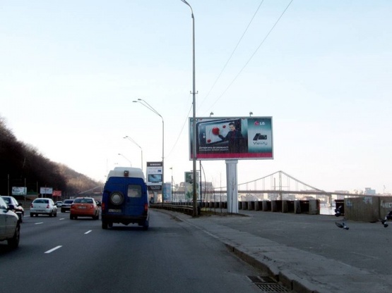 Фото рекламної площини за адресою Набережное шоссе(4)(800м к Пеш. Мост.)
