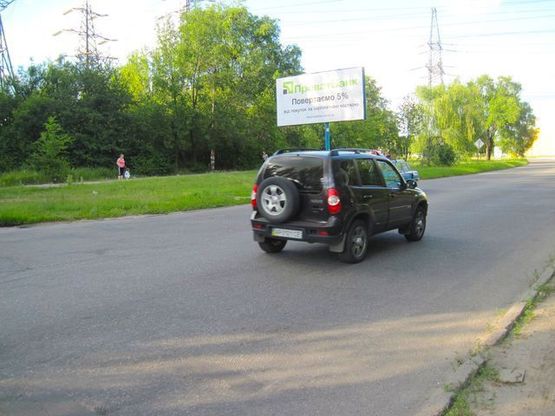 Фото рекламной плоскости по адресу ул.Чаривная-ул.Полякова