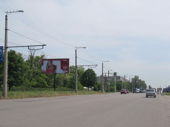 Фото рекламной плоскости по адресу Героев Украины ул. - Жадова ул., (супермаркет "Копилка", из центра)