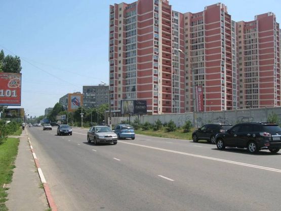 Фото рекламной плоскости по адресу перекрёсток ул.1Мая, ул.Карла Маркса, №14-А,  Въезд в Ильичёвск, высотный микрорайон "Стройтехснаб"