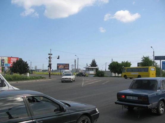 Фото рекламной плоскости по адресу ул. Победы, пост ГАИ, Въезд в Ильичёвск, транспортное сообщение с Одессой, маршрут всего общественного транспорта, дорога в Ильичёвский Морской Торговый Порт