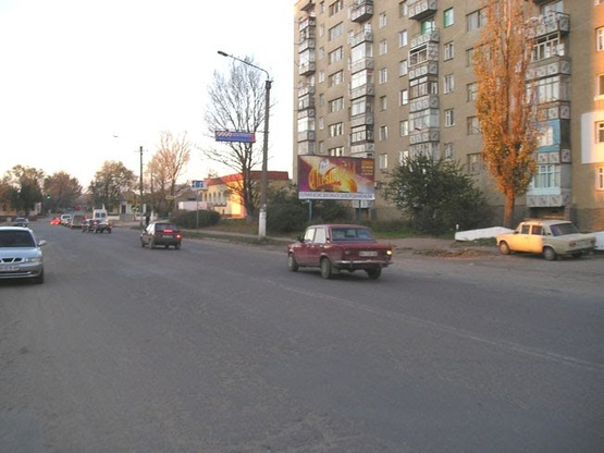 Фото рекламної площини за адресою ул.Школьная, р-н"ТИРА", мини-рынок, АТБ, в центр