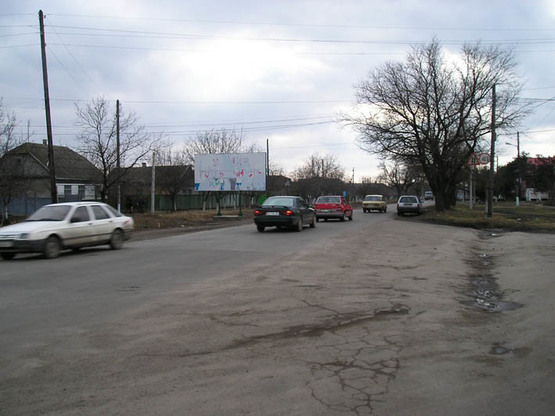 Фото рекламной плоскости по адресу пр.Суворова-ул. М.Жукова, пр.Суворова угол ул. М.Жукова, Автомаркет, по движению от ТЦ "Таврия-В"