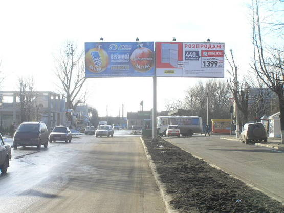 Фото рекламной плоскости по адресу Стоматология,  пр-кт Победы на разделительной полосе напротив стомат поликлиники