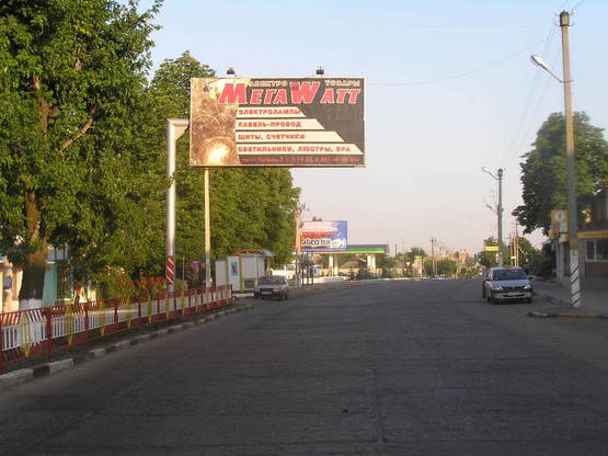 Фото рекламной плоскости по адресу Зоомир, вдоль ул. 50 лет Октября  возле маг. "Зоомир"