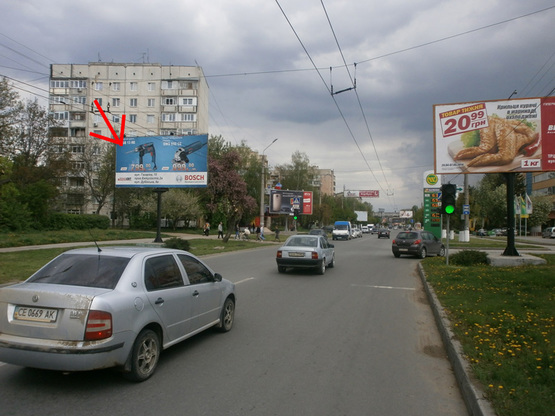 Фото рекламной плоскости по адресу вул. Комарова, 10 / пров. Ентузіастів ("WOG")