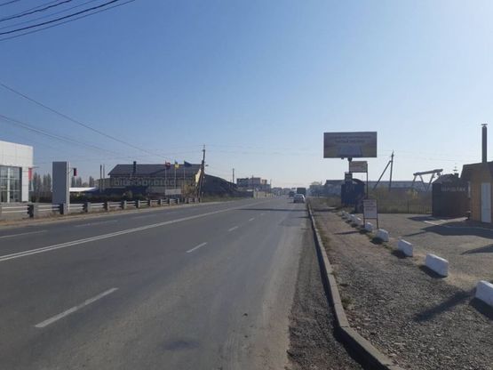 Фото рекламной плоскости по адресу с. Мамаївці по вул. Шевченка (біля автобусної зупинки)