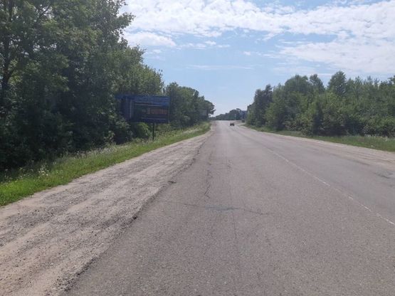 Фото рекламної площини за адресою м. Хотин, вул. Т. Шевченка (біля в*їздного знака м. Хотин)