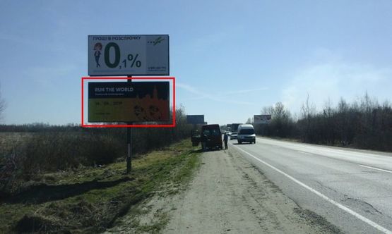 Фото рекламной плоскости по адресу М-10 Западный обход, возле Автохата в сторону ТЦ "King Cross" , нижний