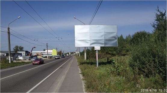 Фото рекламной плоскости по адресу въезд во Львов со стороны Давыдова, возле спецтехники, Зеленая ул.