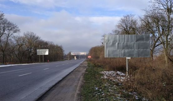 Фото рекламной плоскости по адресу Объездная М-06, подъезд до г.Львов, перед Дублянами АЗС Shell въезд во Львов