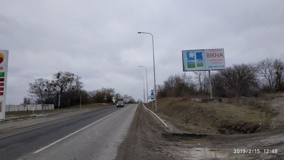 Фото рекламной плоскости по адресу Автодорога Львов-Пустомиты, выезд из г. Пустомиты, возле АЗС