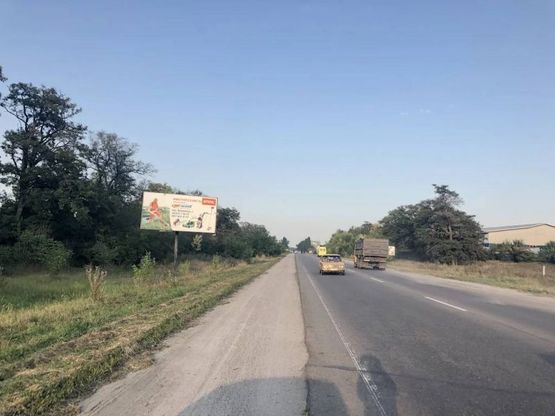 Фото рекламної площини за адресою Сквирське шосе, перехрестя на  "Митницю", в"їзд в місто      сторона Б