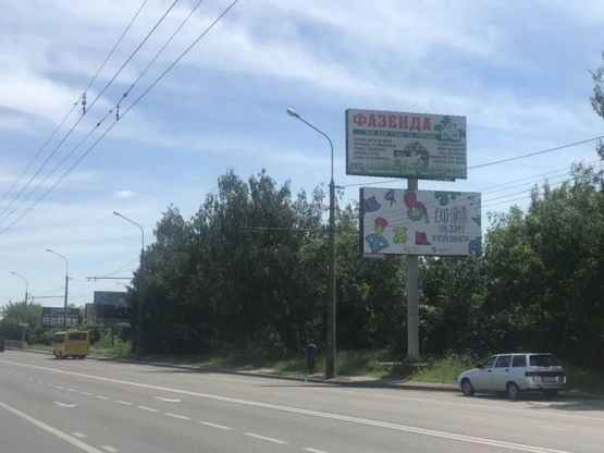 Фото рекламной плоскости по адресу вул. Кн. Володимира перехрестя з вул.Шевченко  (напрямок з центру) + ПОКЛЕЙКА З ВИШКИ/А1 низ