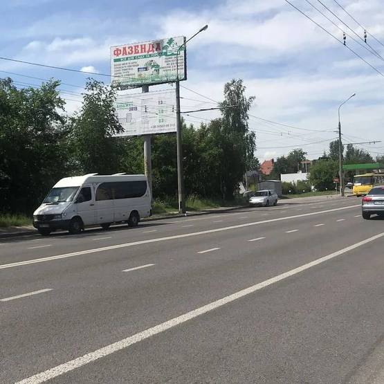 Фото рекламной плоскости по адресу вул. Кн. Володимира перехрестя з вул.Шевченко  (напрямок в центр) + ПОКЛЕЙКА З ВИШКИ/Б2 верх