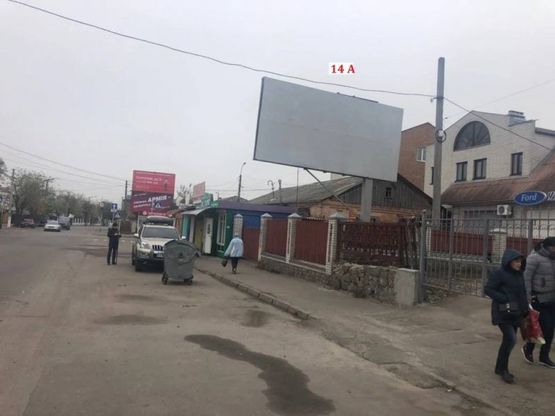 Фото рекламной плоскости по адресу вул. Ярмаркова магазин ФОРД (напрямок в сторону стадіону)