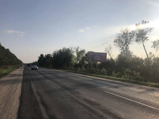 Фото рекламной плоскости по адресу В`ЇЗД-в-м.Біла-Церква-з-Київ (біля заправки ГЛУССКО)