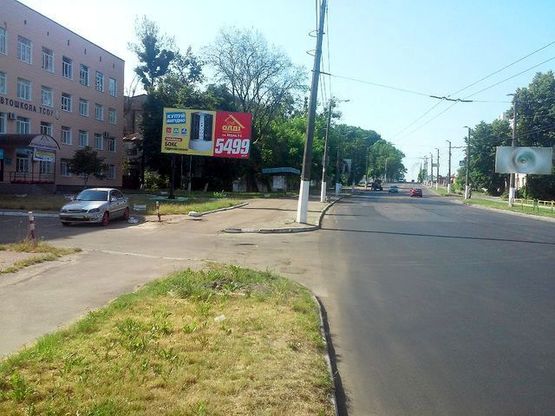 Фото рекламной плоскости по адресу Победы ул., 92 (Автошкола, 200м до Приват Банка)