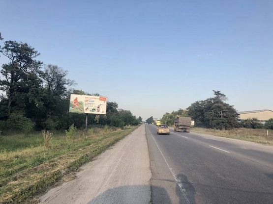 Фото рекламной плоскости по адресу Сквирське шосе, перехрестя на  "Митницю", в"їзд в місто