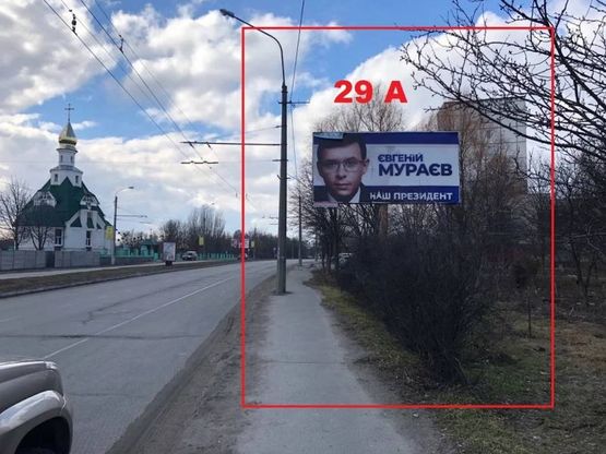 Фото рекламной плоскости по адресу вул. Князя Володимира, біля магазину АТБ, напрямок в сторону центру