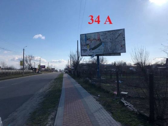 Фото рекламной плоскости по адресу вул. Дружби,  напрямок до Піщаного масиву (за старим МРЕО)