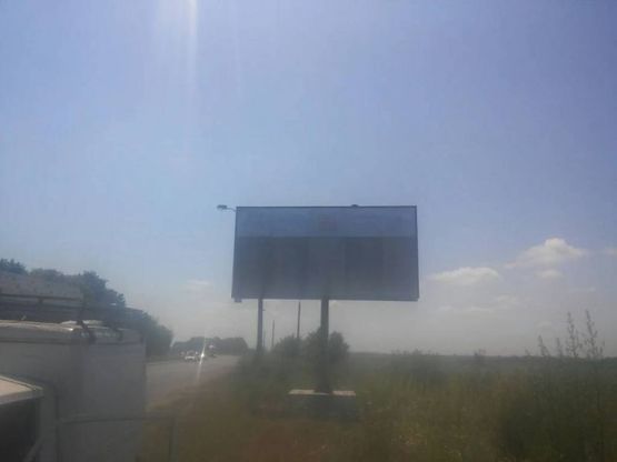 Фото рекламної площини за адресою Автодорога Одеса - Київ, сторона А - в сторону м.Одеса (біля заправки, за КП)