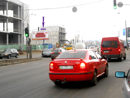Фото рекламной плоскости по адресу Днепровская Набережная, напротив суп-та "Новус", на светофоре