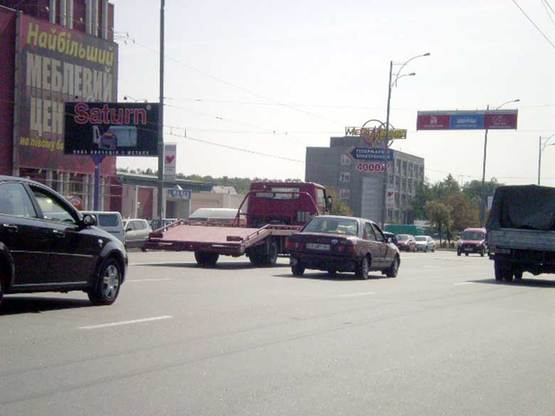 Фото рекламної площини за адресою ул.Братиславская,52, м-н "Б-52", "АТЛ", напрвл. на рынок Юность