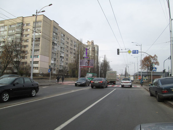 Фото рекламной плоскости по адресу ул.Святошинская,6\ ул. Верховинная, напротив с\м "Новус" на светофоре