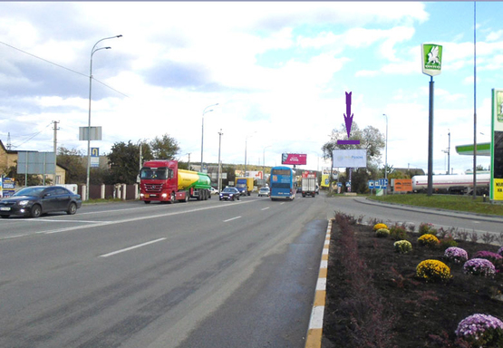 Фото рекламної площини за адресою Гостомельское шоссе, 23км+700м,  АЗС "ОККО", выезд из Ирпеня, направление в Киев