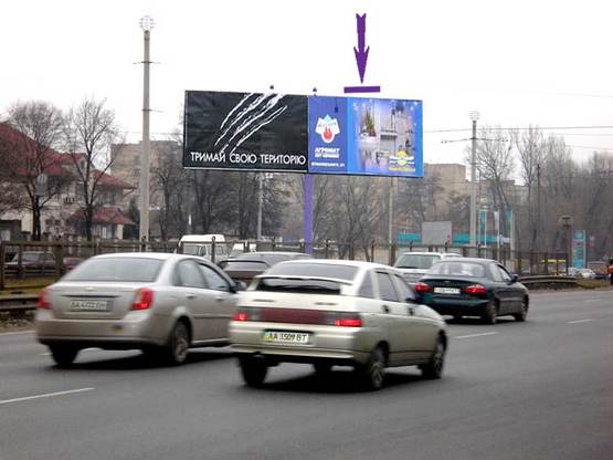 Фото рекламної площини за адресою Кільцева біля Шпалерного ринку у напрямку Одеської пл. ("чебурашка" праве вухо)