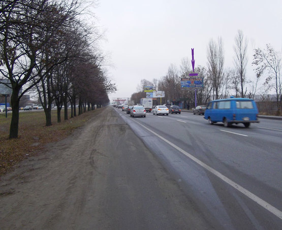 Фото рекламної площини за адресою Кільцева дорога, перед ринком "Столичний" на зупинці