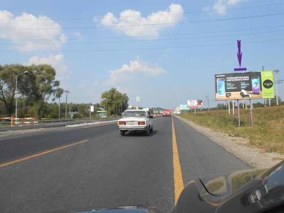 Фото рекламної площини за адресою Обухівска траса 21 км. - Лісники - у напрямку Києва