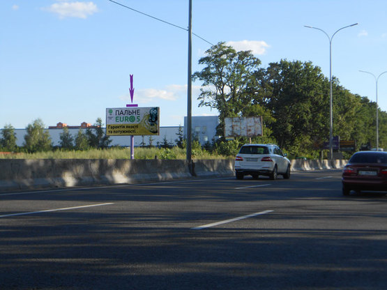 Фото рекламной плоскости по адресу Одеська траса, 500 м від Нової Линії, напрямок на Одесу