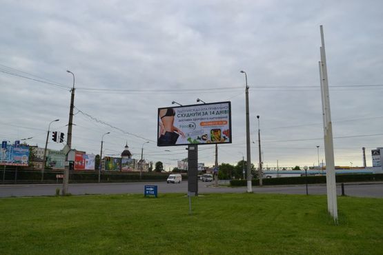 Фото рекламной плоскости по адресу вул. Карпенка-Карого (біля АЗС "Укрпетроль")