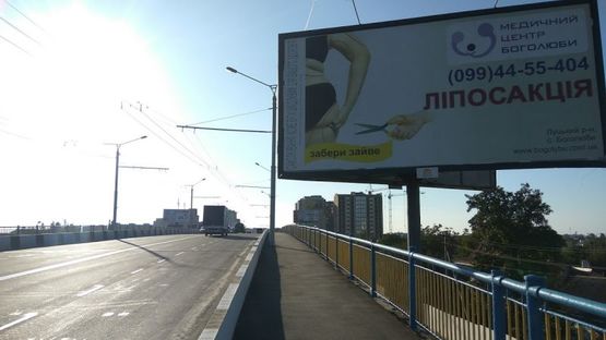 Фото рекламной плоскости по адресу вул. Рівненська, 53 (шляхопровід)