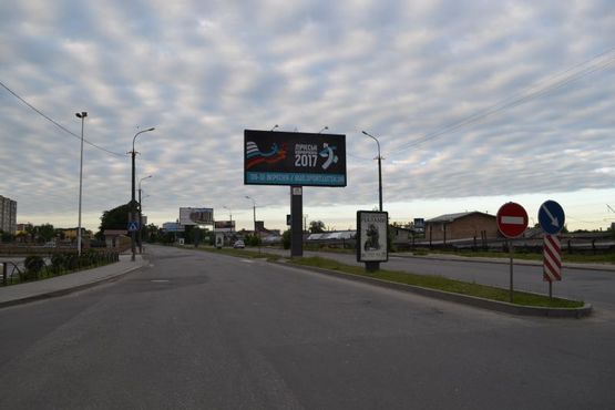 Фото рекламной плоскости по адресу перехрестя вул. К.-Карого-вул. Сухомлинського