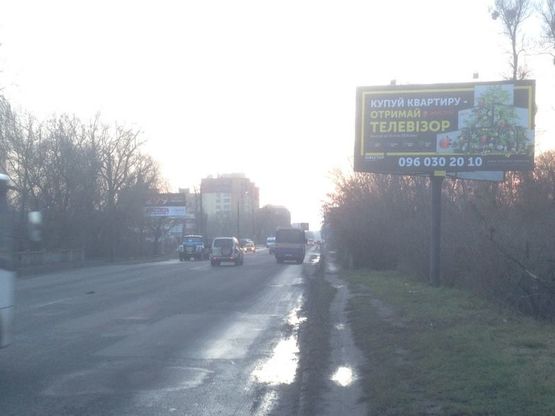 Фото рекламної площини за адресою вул. Набережна  навпроти автомийки