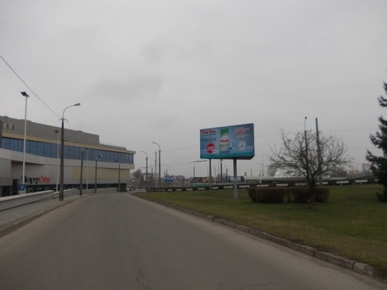 Фото рекламной плоскости по адресу трансп. Розв. пр.Соборності-вул.Карпенка-Карого(острівок Порт сіті)