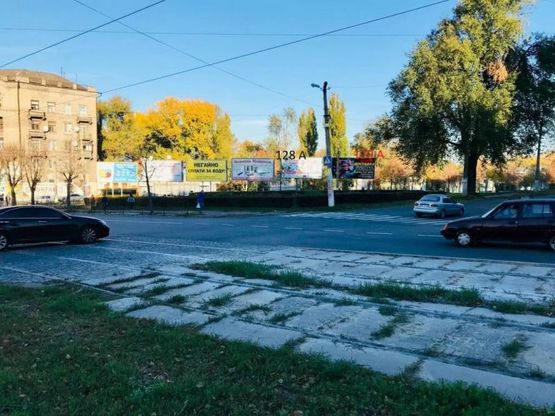 Фото рекламной плоскости по адресу пр-т. Ленніна-пр-т. Аношкіна (р-н маг. Дружба) Заводський р