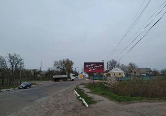 Фото рекламної площини за адресою ул.Житомирская - И.Франко, 67, рынок, из центра, в напр. Житомира