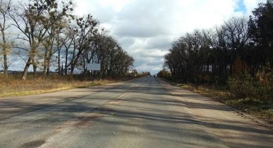 Фото рекламної площини за адресою ул. Киевская, АЗС "ОККО", АЗС "КЛО", въезд в город со ст. Житомира, 100м от въезда