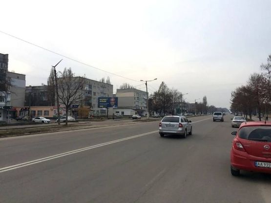 Фото рекламної площини за адресою ул. Киевская, 109, напротив Фуршета, Комфи, универмаг, в напр. выезда на Житомир